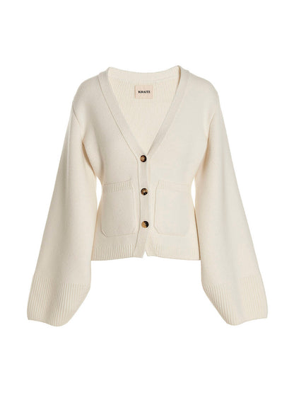 Cardigan by Khaite for women in cashmere white showcases a captivating silhouette, artfully detailed with a captivating and v-neck neckline for a truly sophisticated captivating look.