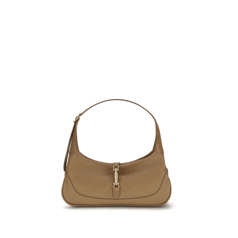 This Medium Shoulder Hobo Handbag by Gucci for women in bos taurus calf grained leather and beige, gold, natural & signature presents a sculptural silhouette featuring a secure zipper, ample , and versatile shoulder-strap & handle for a sculptural finish.