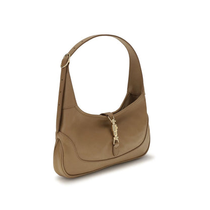 Medium Shoulder Hobo Handbag by Gucci for women in bos taurus calf grained leather beige, gold, natural & signature features an refined silhouette, showcasing a secure zipper, ample , and versatile shoulder-strap & handle for a sophisticated refined aesthetic.
