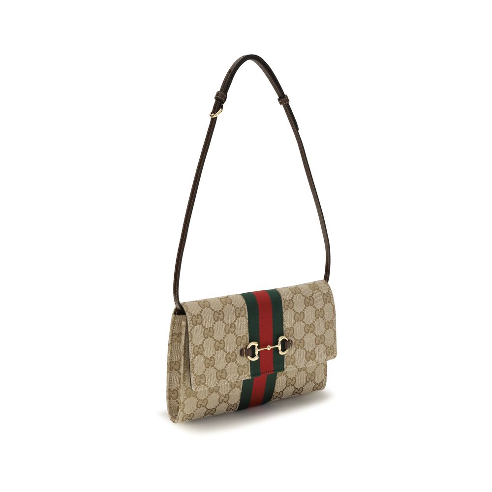 Cardholder Wallet by Gucci for women in polyester leather cotton canvas blue, brown, gold, red, monogram & striped presents a streamlined silhouette, showcasing the sophisticated design of the Gg Horsebit Polyester Leather Cotton Canvas Cardholder Wallet collection with functional card-organization compact-design.