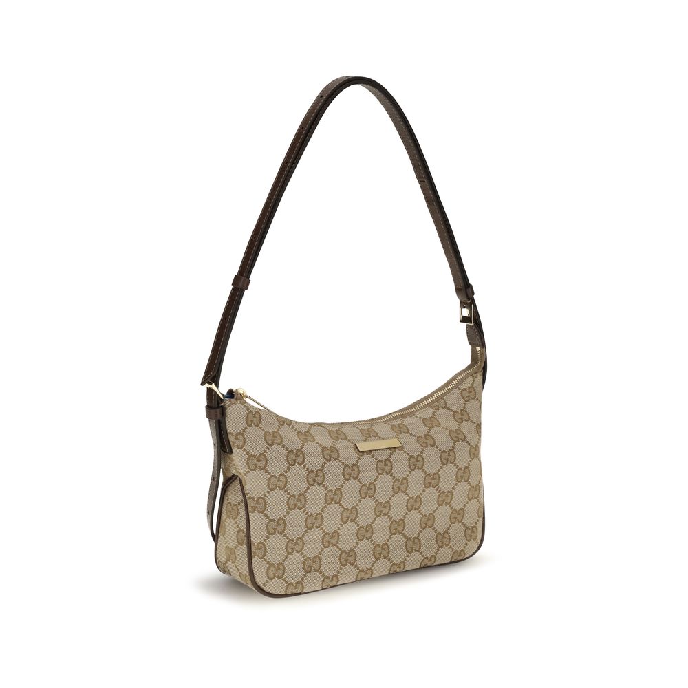 Small Flap Handbag by Gucci for women in polyester leather cotton canvas beige, gold & monogram features a signature silhouette, showcasing a secure zipper and signature with versatile shoulder-strap, handle, adjustable-strap & detachable-strap for a sophisticated look.