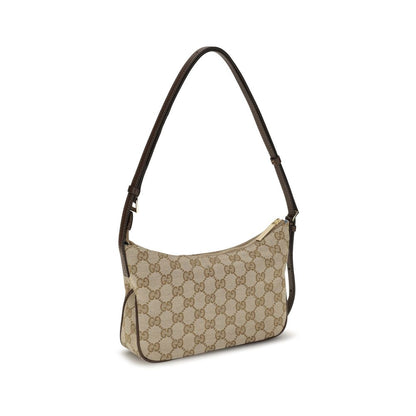 This Small Flap Handbag by Gucci for women in polyester leather cotton canvas and beige, gold & monogram presents a sculptural silhouette featuring a secure zipper, ample , and versatile shoulder-strap, handle, adjustable-strap & detachable-strap for a sculptural finish.