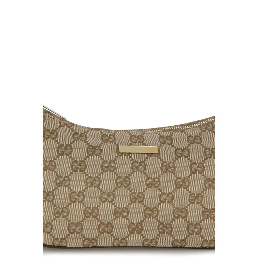 Small Flap Handbag by Gucci for women in polyester leather cotton canvas beige, gold & monogram presents a ornamental silhouette, showcasing a secure zipper, ample , and versatile shoulder-strap, handle, adjustable-strap & detachable-strap for a ornamental finish.