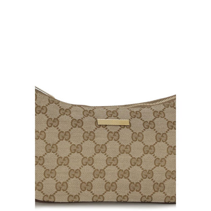 Small Flap Handbag by Gucci for women in polyester leather cotton canvas beige, gold & monogram presents a ornamental silhouette, showcasing a secure zipper, ample , and versatile shoulder-strap, handle, adjustable-strap & detachable-strap for a ornamental finish.