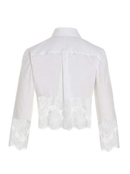 Blouse by Dolce & Gabbana for women in stretch polyamide cotton white, featuring a nuanced and nuanced for a sophisticated finish.