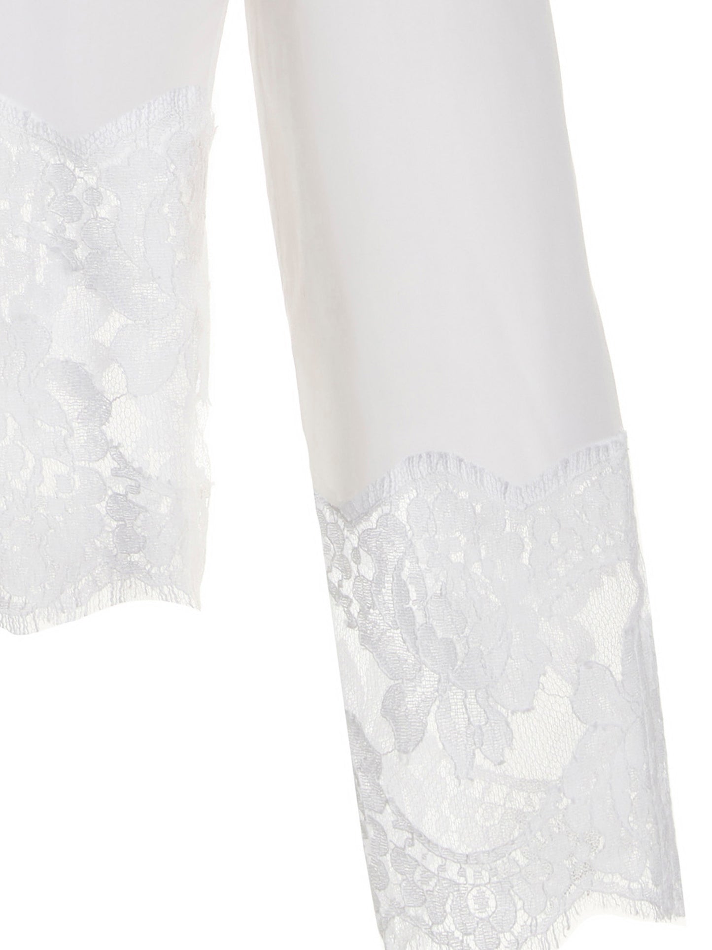Blouse by Dolce & Gabbana for women in stretch polyamide cotton white showcases a sublime silhouette, artfully detailed with a sublime and for a sophisticated, sublime finish.