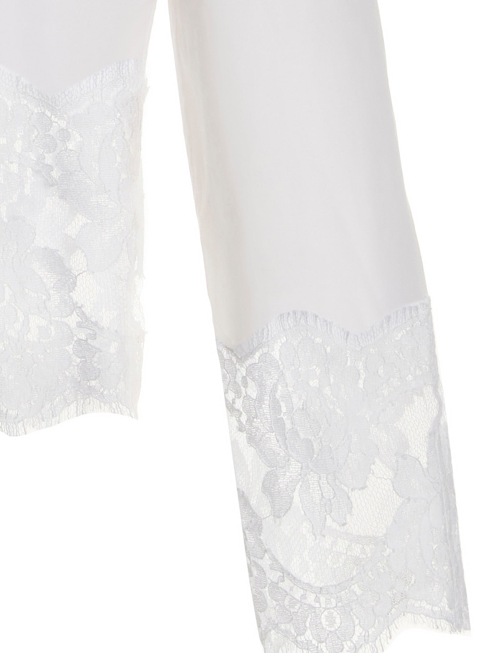 Blouse by Dolce & Gabbana for women in stretch polyamide cotton white showcases a sublime silhouette, artfully detailed with a sublime and for a sophisticated, sublime finish.