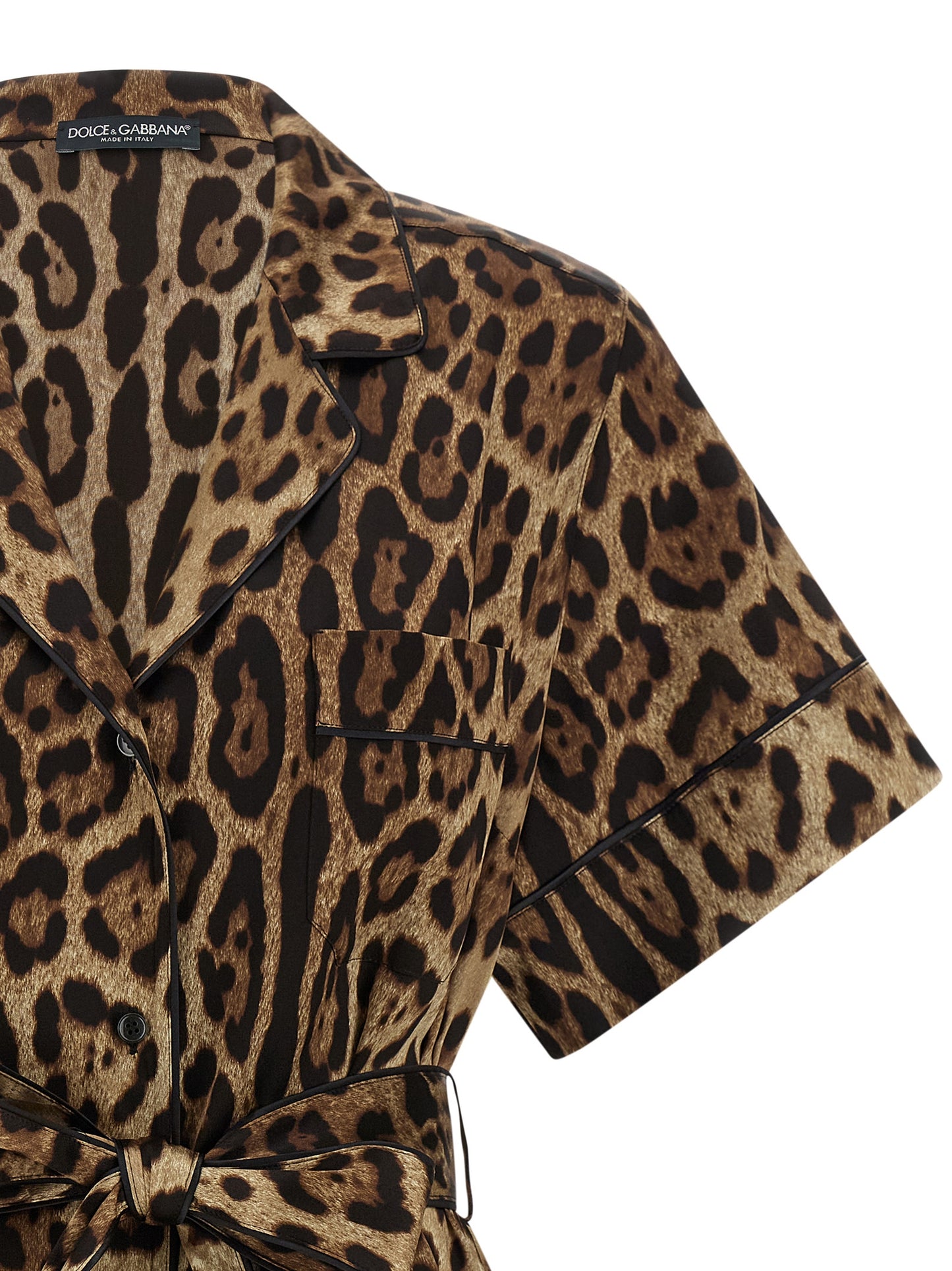 Blouse by Dolce & Gabbana for women in silk black, brown, leopard-print & print showcases a sharp silhouette, elegantly detailed with a sharp and sharp .