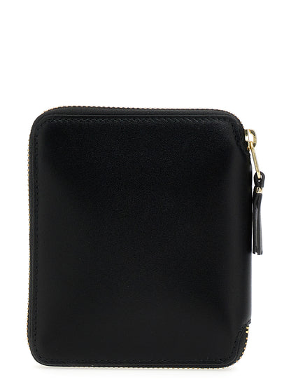 Cardholder Card Case by Comme Des Garçons for unisex in calfskin leather black & print features an dynamic silhouette from the Calfskin Leather Cardholder Card Case collection, highlighting dynamic card-organization compact-design for a premium and sophisticated look.