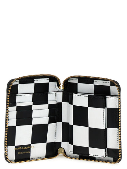 Cardholder Card Case by Comme Des Garçons for unisex in calfskin leather black & print features a sleek silhouette, showcasing the sleek design of the Calfskin Leather Cardholder Card Case with functional card-organization compact-design for a premium look.