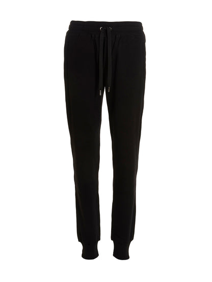 Joggers by Dolce & Gabbana for men in cotton black features a refined silhouette with a refined , defined by a and a refined long for a refined finish.