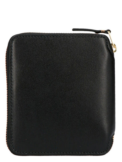Wallet by Comme Des Garçons for men in bos taurus suede calfskin leather black presents a streamlined silhouette, showcasing the sophisticated design of the Arecalf Bos Taurus Suede Calfskin Leather Wallet collection with functional zip-around.