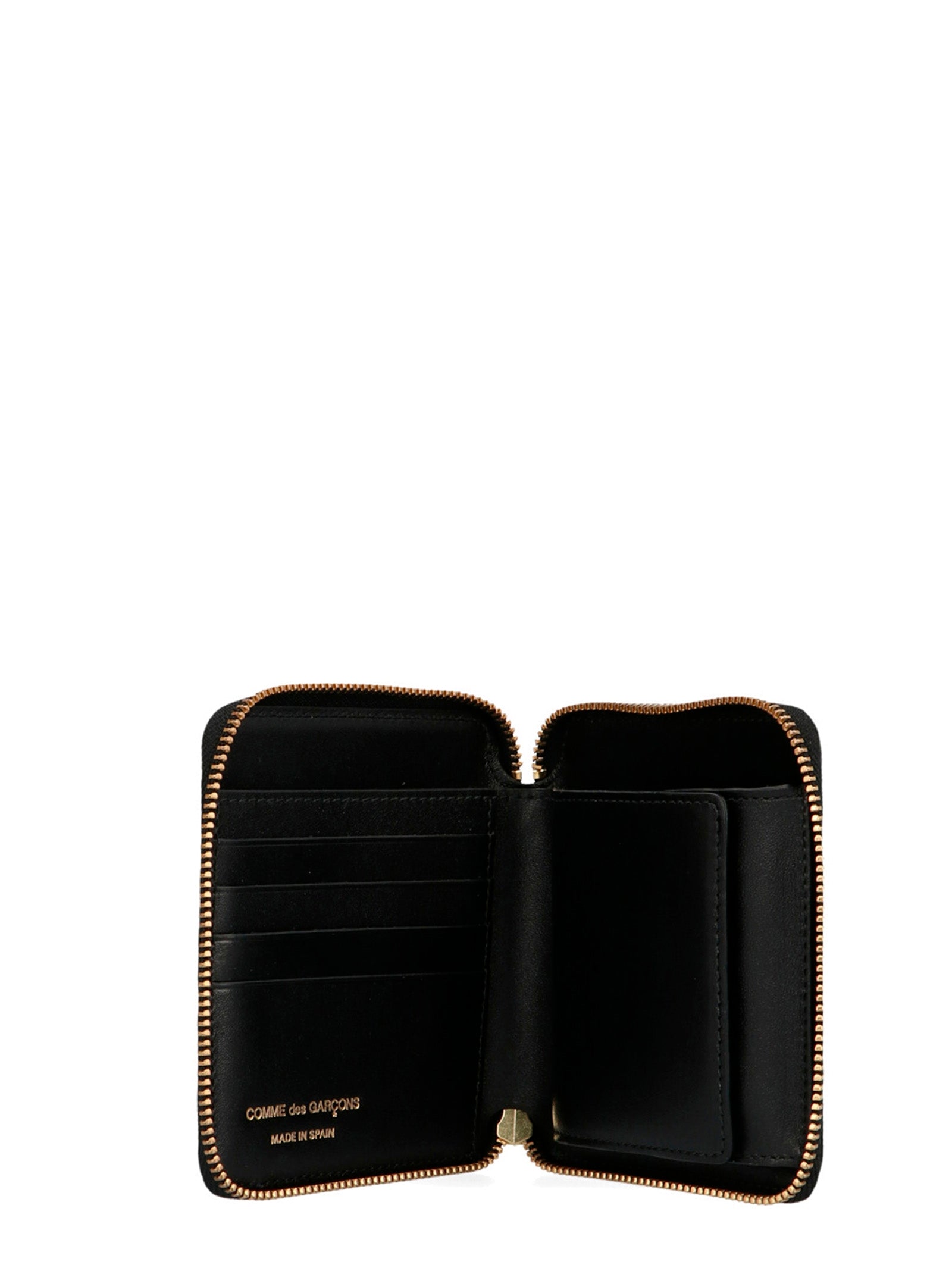 Wallet by Comme Des Garçons for men in bos taurus suede calfskin leather black showcases a enchanting silhouette, artfully detailed with the signature style of the Arecalf Bos Taurus Suede Calfskin Leather Wallet and functional zip-around.