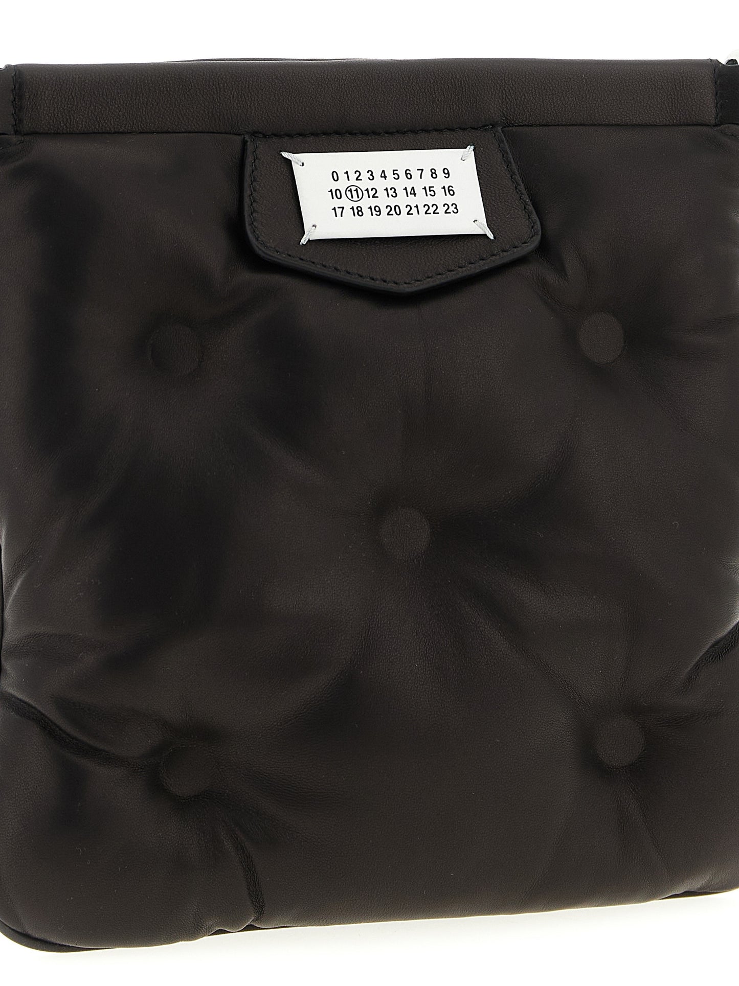 Mini 2-in-1 Shoulder & Crossbody Clutch Handbag by Maison Margiela for women in nappa lamb leather black & signature features a transformative elegance silhouette, showcasing a secure magnetic, organized , and versatile crossbody-strap, shoulder-strap & adjustable-strap for a transformative elegance look.