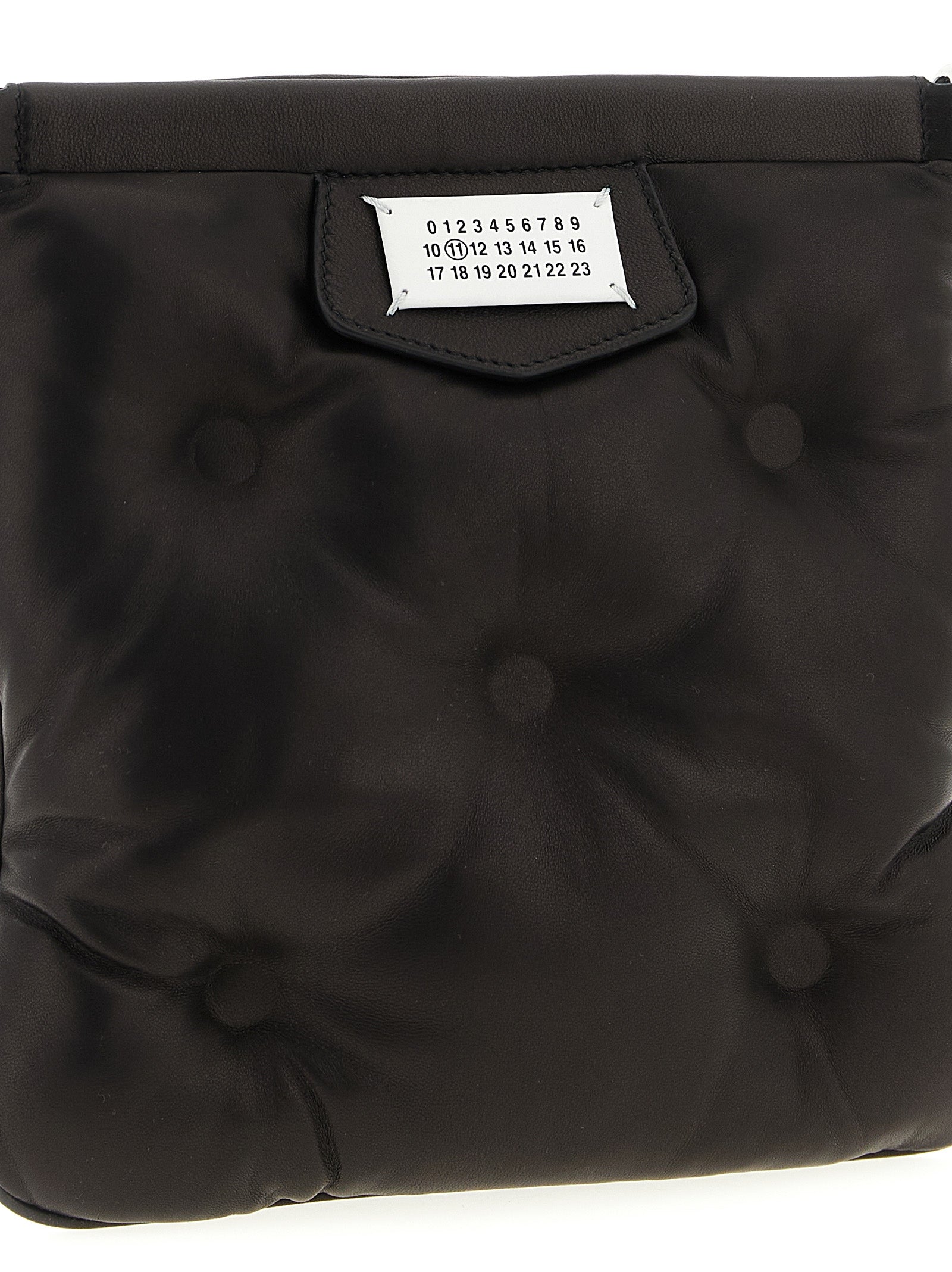 Mini 2-in-1 Shoulder & Crossbody Clutch Handbag by Maison Margiela for women in nappa lamb leather black & signature features a transformative elegance silhouette, showcasing a secure magnetic, organized , and versatile crossbody-strap, shoulder-strap & adjustable-strap for a transformative elegance look.