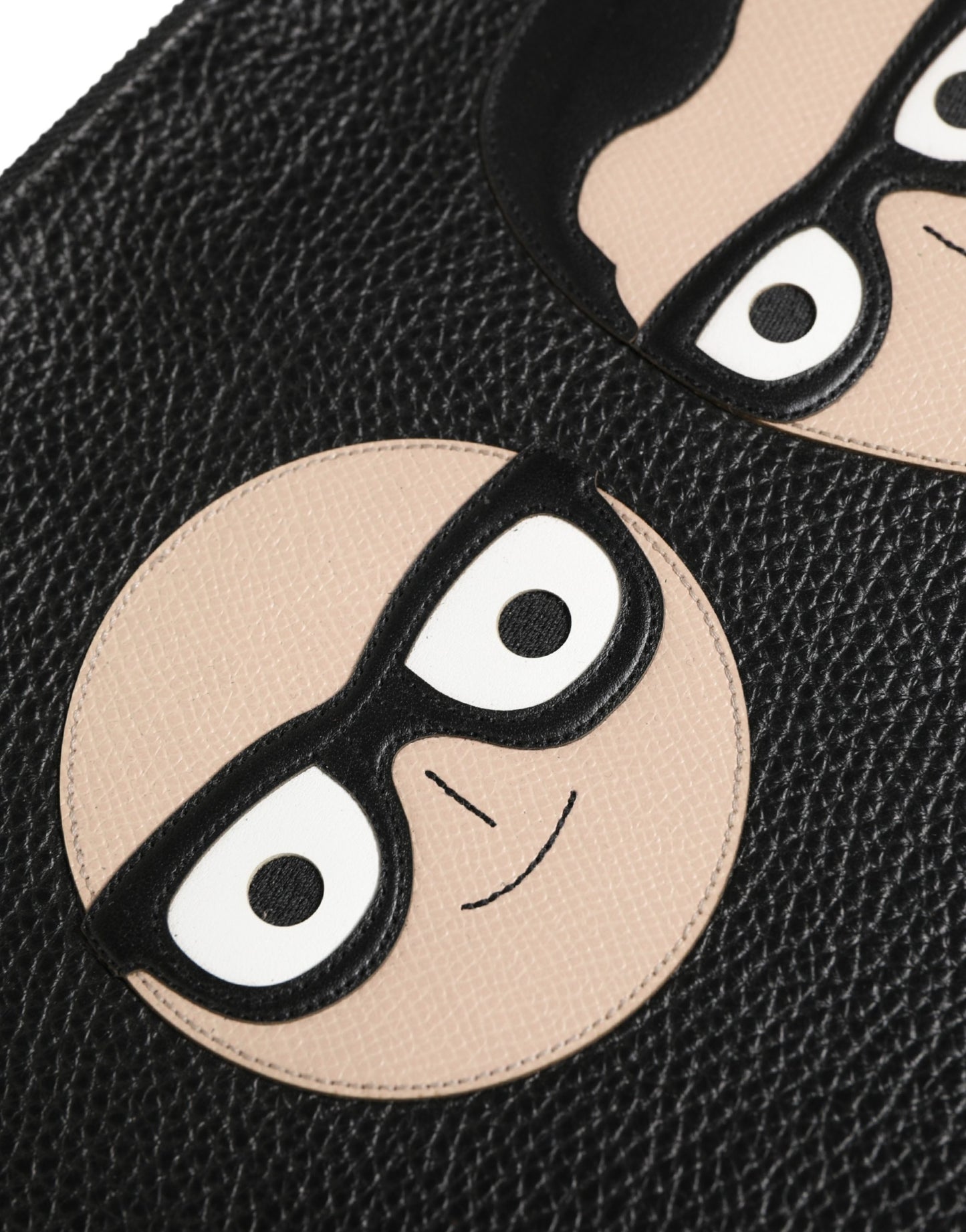 Pouch Clutch Convertible Handbag by Dolce & Gabbana for unisex in calfskin leather black & silver features an exquisite silhouette, showcasing a secure zipper, ample , and exquisite for a sophisticated finish.