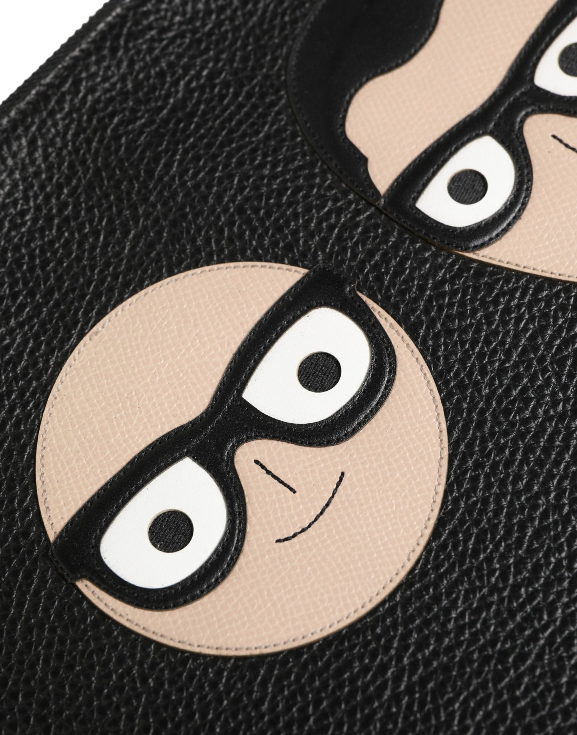 Pouch Clutch Convertible Handbag by Dolce & Gabbana for unisex in calfskin leather black & silver features an exquisite silhouette, showcasing a secure zipper, ample , and exquisite for a sophisticated finish.