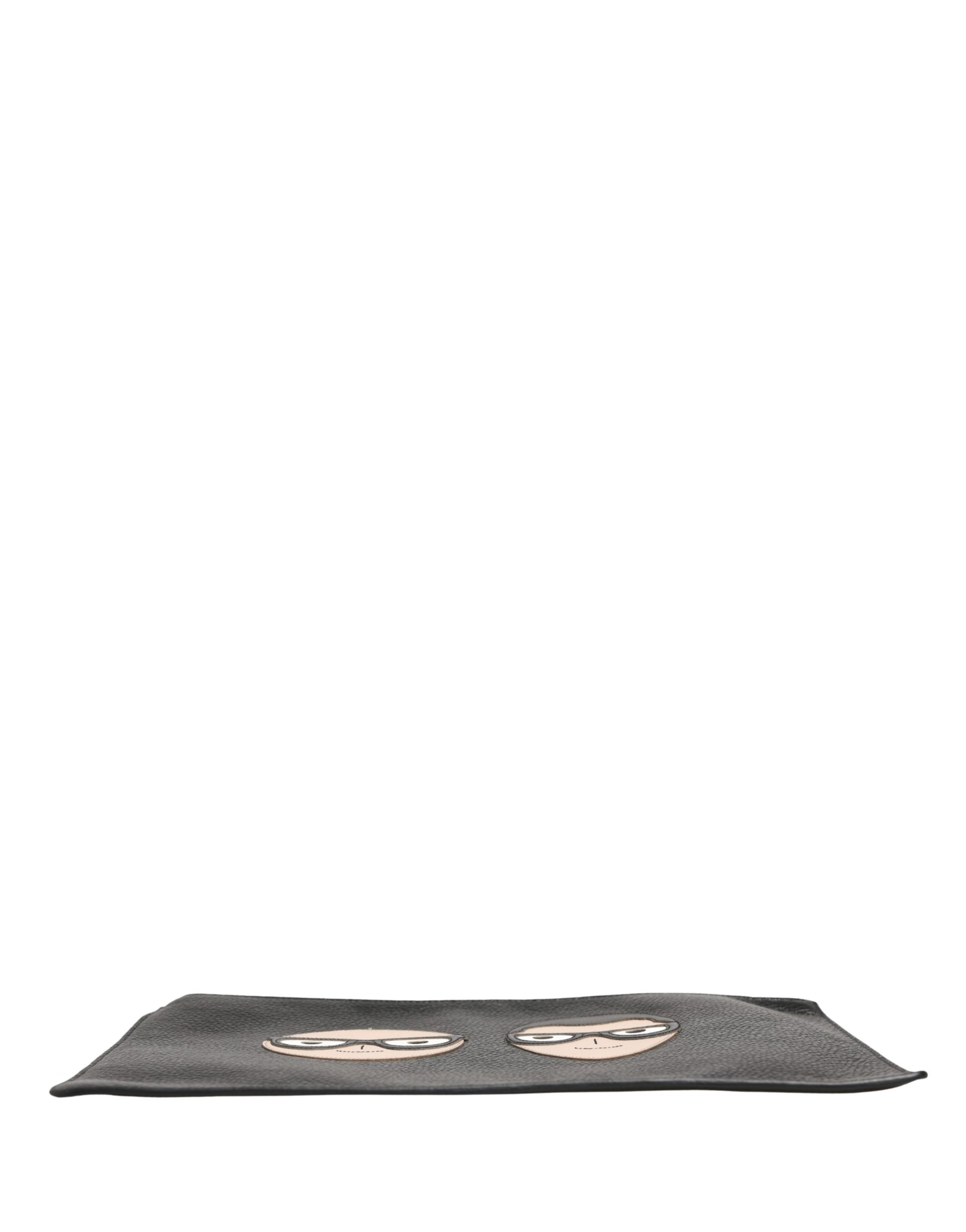 Pouch Clutch Convertible Handbag by Dolce & Gabbana for unisex in calfskin leather black & silver presents a enviable design with a secure zipper, ample , and versatile for a sophisticated look.