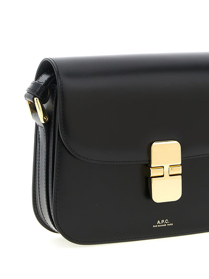 Small Crossbody Flap Handbag by A.P.C. for women in cowhide leather black & gold features a transformative sophistication silhouette, showcasing a secure flap, ample , and versatile crossbody-strap, shoulder-strap & adjustable-strap for a transformative sophistication look.
