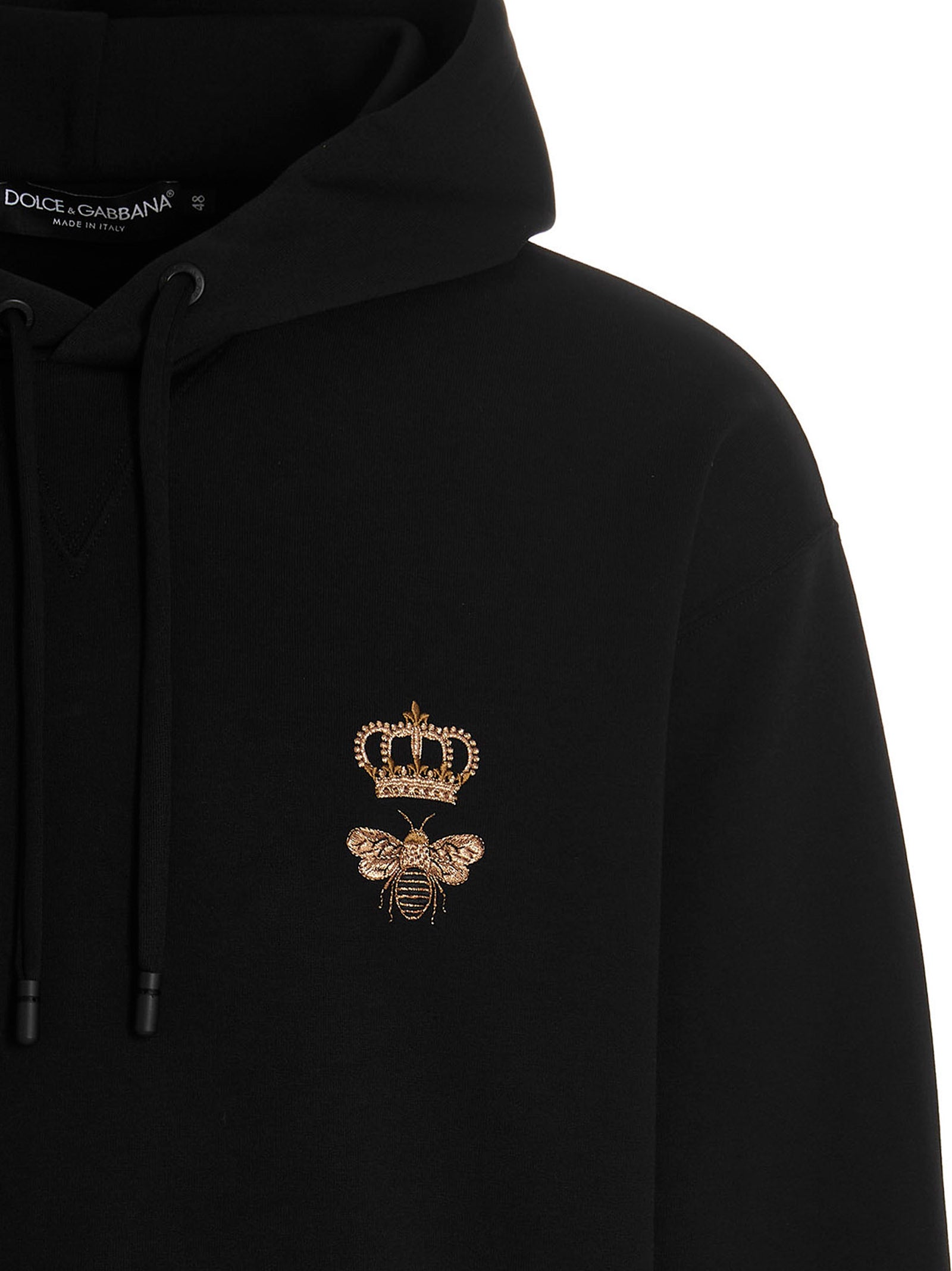 Sweatshirt Hoodie by Dolce & Gabbana for men in cotton polyester black features an dramatic silhouette, showcasing a sophisticated hooded neckline and dramatic for a refined, modern aesthetic.