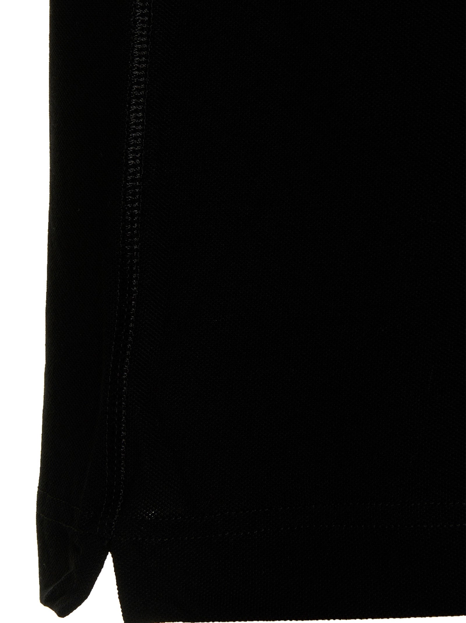 This Polo Shirt by Dolce & Gabbana for men in cotton black presents a flawless silhouette, showcasing flawless detailing and a refined for a truly flawless aesthetic.