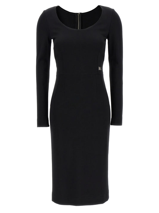 Dress by Dolce & Gabbana for women in viscose & polyamide black features a dramatic silhouette, showcasing an elegant round neckline and that flows into a dramatic midi.