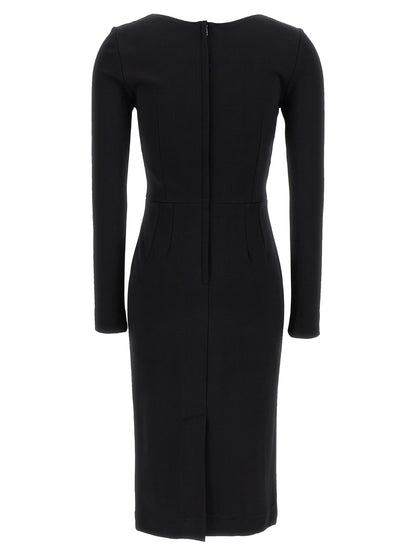 Dress by Dolce & Gabbana for women in viscose & polyamide black features an sultry silhouette defined by a round neckline and , falling to an sultry midi for a sultry look.