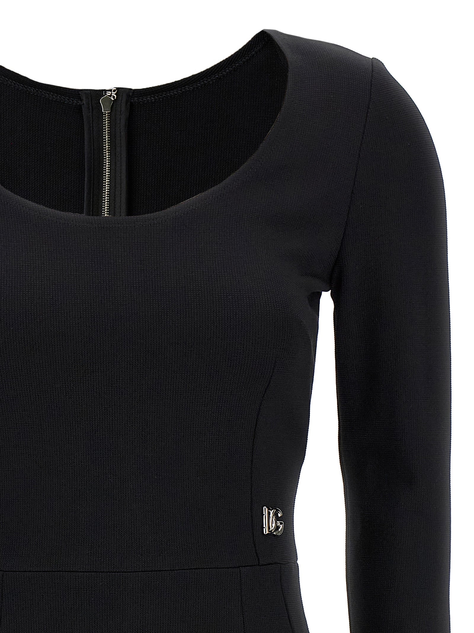 Dress by Dolce & Gabbana for women in viscose & polyamide black features an magnificent silhouette, artfully detailed with a magnificent round neckline and that flows into an magnificent midi.
