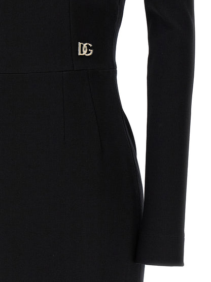 Dress by Dolce & Gabbana for women in viscose & polyamide black presents a sinuous silhouette, showcasing a sophisticated and detailed with a sinuous midi for a refined finish.
