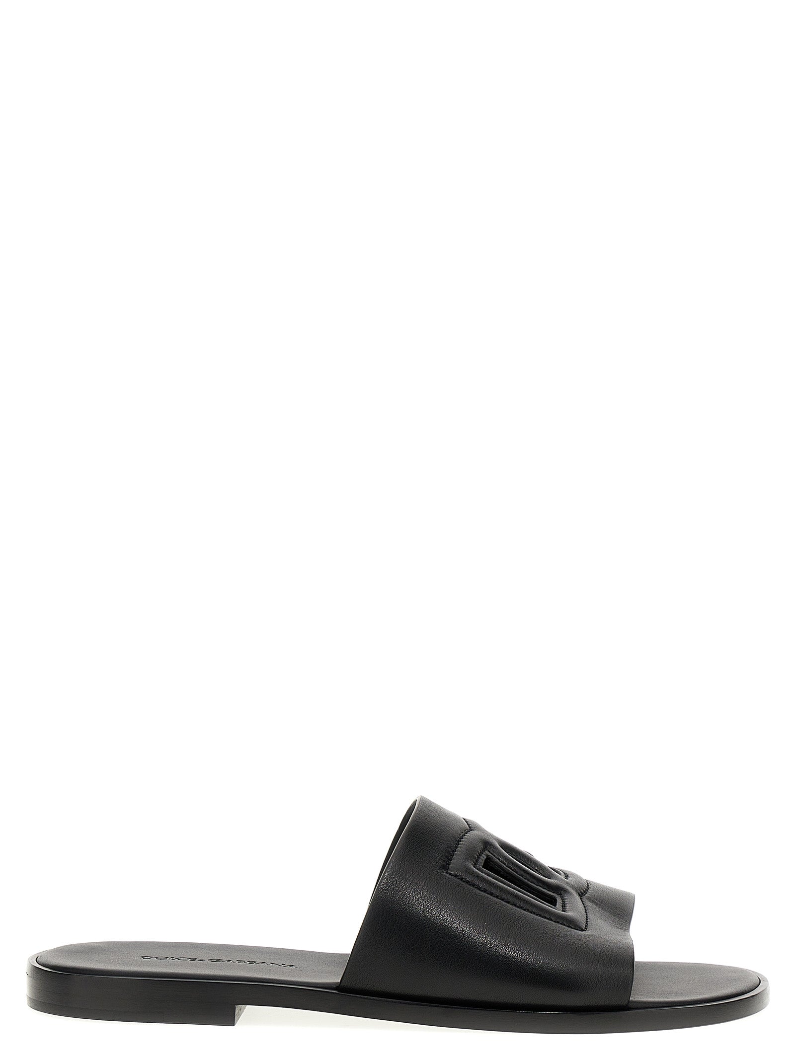 Flat Shoes by Dolce & Gabbana for men in leather black showcases a impeccable silhouette as Men's Leather Flat Shoes, artfully designed with a impeccable flat and refined for a impeccable finish.