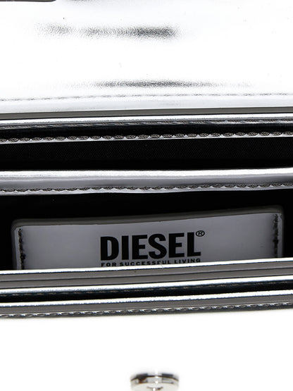 Evening Shoulder Bag by Diesel for women in leather silver & signature features a effortless chic silhouette with a secure flap, ample , and versatile shoulder-strap & adjustable-strap for a effortless chic finish.
