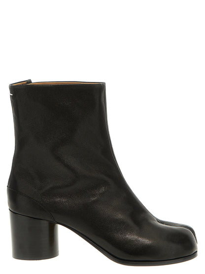 Ankle Boots by Maison Margiela for women in bos taurus calf nappa leather black & signature features an effortless chic silhouette from the Essence Women's Bos Taurus Calf Nappa Leather Ankle Boots collection, showcasing a effortless chic and refined for an effortless chic look.
