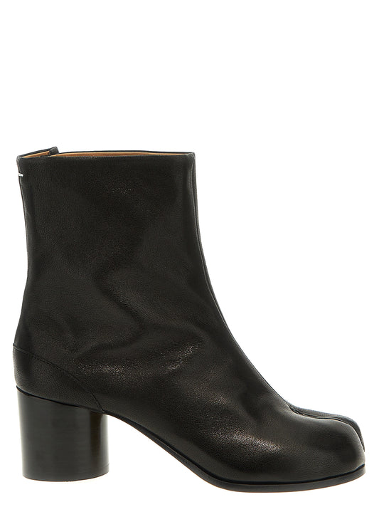 Ankle Boots by Maison Margiela for women in bos taurus calf nappa leather black & signature features an effortless chic silhouette from the Essence Women's Bos Taurus Calf Nappa Leather Ankle Boots collection, showcasing a effortless chic and refined for an effortless chic look.