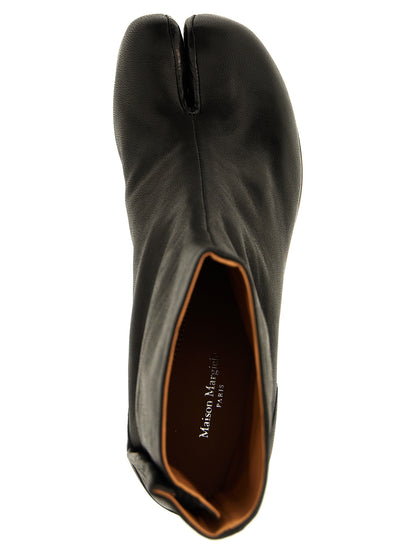 Ankle Boots by Maison Margiela for women in bos taurus calf nappa leather black & signature features an avant-garde Essence Women's Bos Taurus Calf Nappa Leather Ankle Boots silhouette, defined by a sophisticated and a avant-garde .