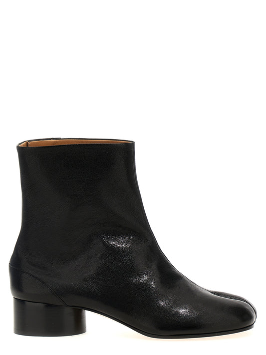 Ankle Boots by Maison Margiela for women in lamb leather black & signature showcases a impeccable silhouette as Women's Lamb Leather Ankle Boots, artfully defined by a impeccable and a impeccable .