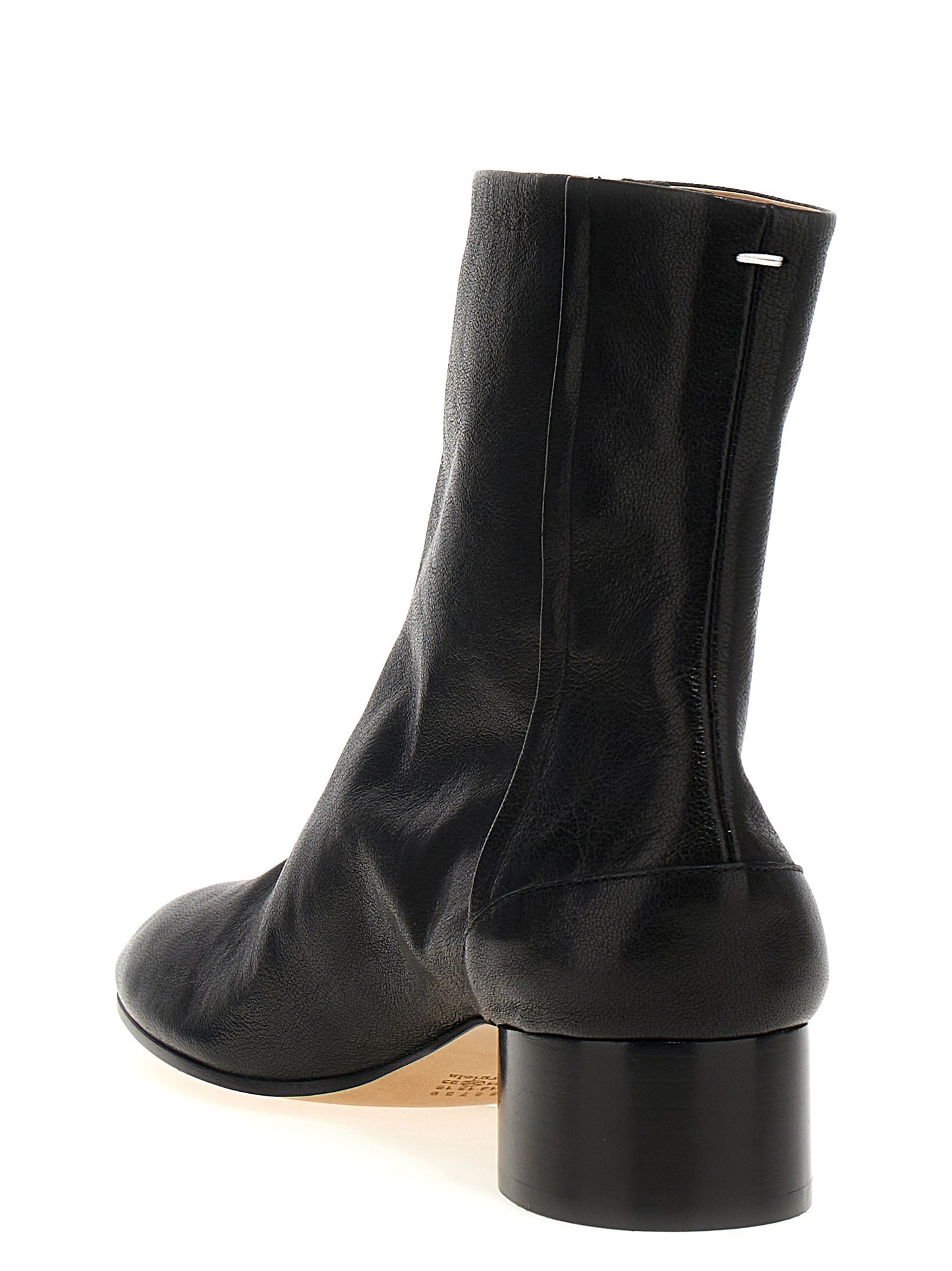 Ankle Boots by Maison Margiela for women in lamb leather black & signature features an dynamic silhouette, showcasing the dynamic Women's Lamb Leather Ankle Boots design with its distinctive and elegant .