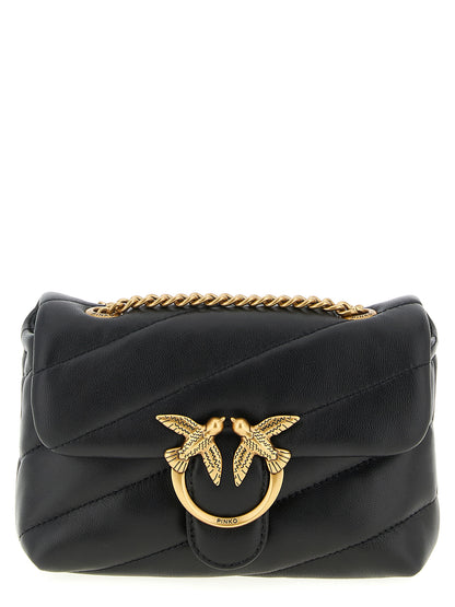 Large Crossbody Flap Handbag by PINKO for women in nappa & suede lamb leather black & signature features a transformative sophistication silhouette, showcasing a secure flap, magnetic & buckle, ample , and versatile crossbody-strap & shoulder-strap for a transformative sophistication look.