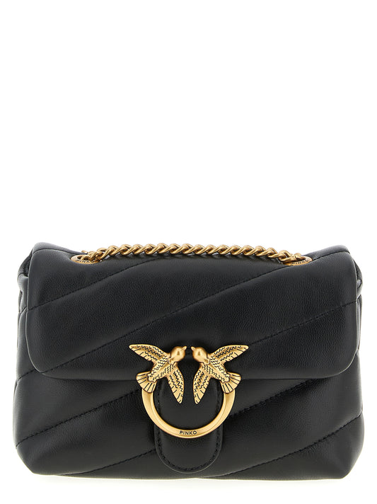 Large Crossbody Flap Handbag by PINKO for women in nappa & suede lamb leather black & signature features a transformative sophistication silhouette, showcasing a secure flap, magnetic & buckle, ample , and versatile crossbody-strap & shoulder-strap for a transformative sophistication look.