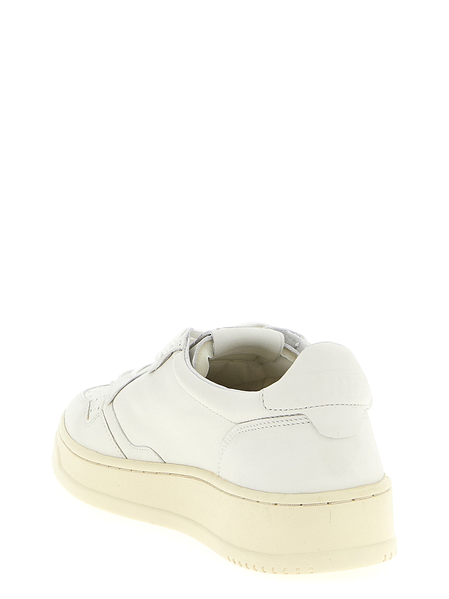 Sneakers by Autry for women in goatskin leather white presents a sumptuous silhouette, artfully capturing the essence of the Women's Low Top Goatskin Leather Sneakers with its sumptuous low-top style design.