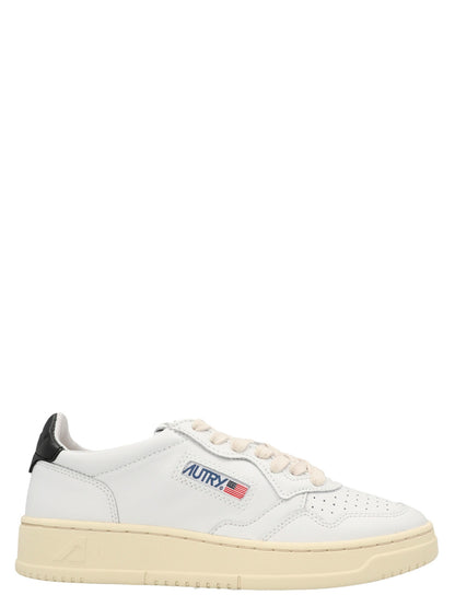 Sneakers by Autry for women in cowhide leather bicolour, black & white features an timeless silhouette from the Women's Low Top Cowhide Leather Sneakers collection, showcasing a signature low-top style with an timeless finish.