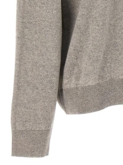 Cardigan by Armarium for women in cashmere gray features a dramatic silhouette, showcasing a sophisticated and dramatic detail for a timeless, premium look.
