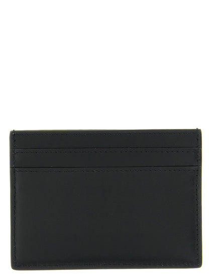 Cardholder Card Case by Saint Laurent for men in calfskin leather black & silver features a sleek silhouette, showcasing the sleek design of the Icon Calfskin Leather Cardholder Card Case with functional card-organization for a premium look.