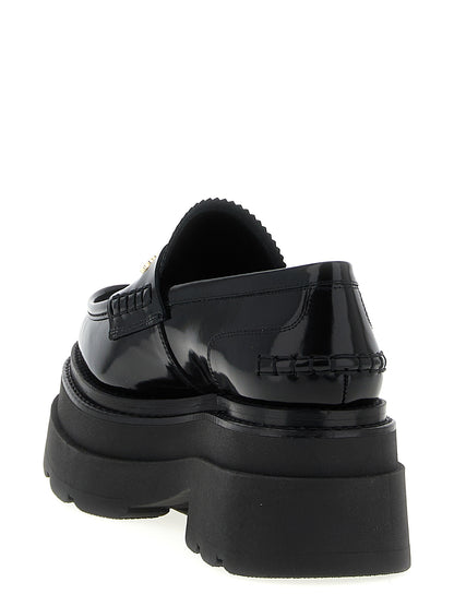 Platform Loafer Shoes by Alexander Wang for women in cowhide leather black features an effortless chic silhouette, showcasing the Women's Cowhide Leather Platform Loafer Shoes design with an effortless chic platform and a for a effortless chic look.