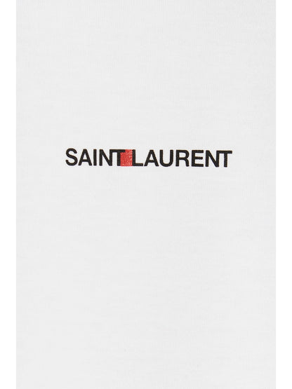 T-Shirt by Saint Laurent for men in cotton white & print showcases a dramatic silhouette, elegantly detailed with a dramatic and for a truly dramatic finish.