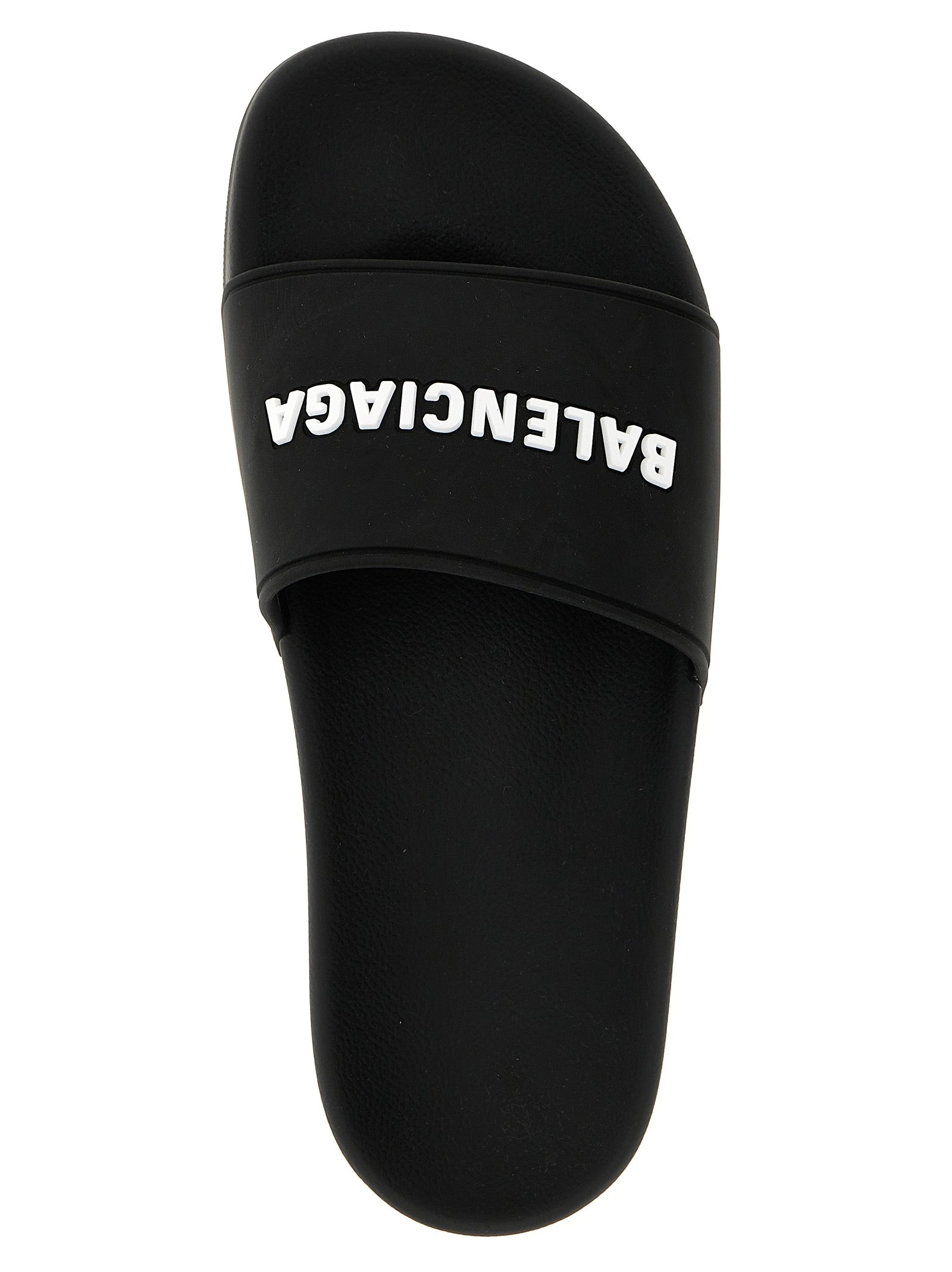 Sliders Sandals Flat Shoes by Balenciaga for women in thermoplastic polyurethane bicolour, black & white presents a effortless chic silhouette, showcasing the Women's Thermoplastic Polyurethane Sliders Sandals Flat Shoes design with a effortless chic and for a sophisticated look.