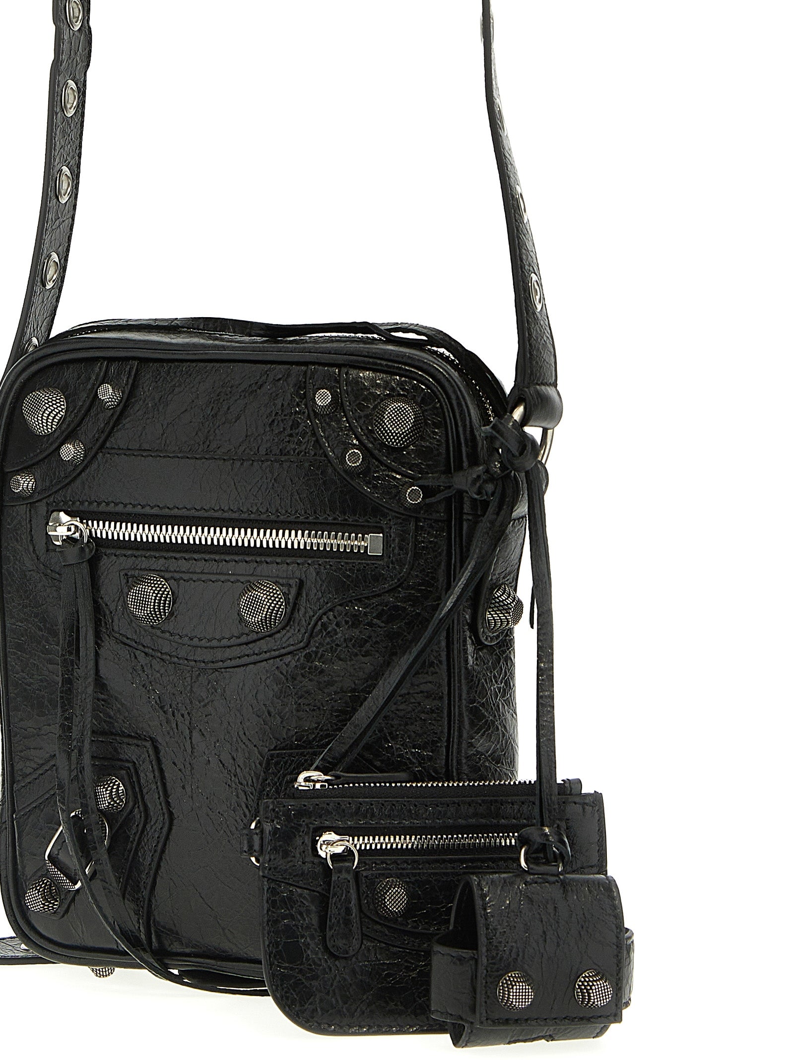 Crossbody Messenger Clutch Bag by Balenciaga for men in polyester & lamb leather black features a distinguished Le Cagole Polyester & Lamb Leather Crossbody Messenger Clutch Bag design with a secure zipper, ample , and versatile crossbody-strap, shoulder-strap & adjustable-strap for a distinguished look.