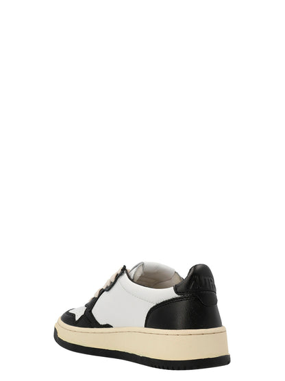 Sneakers by Autry for women in cowhide leather bicolour, black & white features a chic design, perfectly showcasing the chic low-top style of this Women's Low Top Cowhide Leather Sneakers.