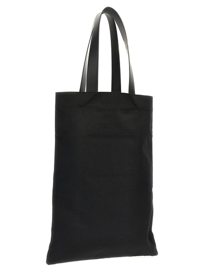 Large Shopper Tote Bag by Jil Sander for women in linen poly cotton canvas & leather black & print features an metropolitan chic Linen Poly Cotton Canvas & Leather Large Shopper Tote Bag design with a secure , metropolitan chic , and versatile handle for a metropolitan chic look.