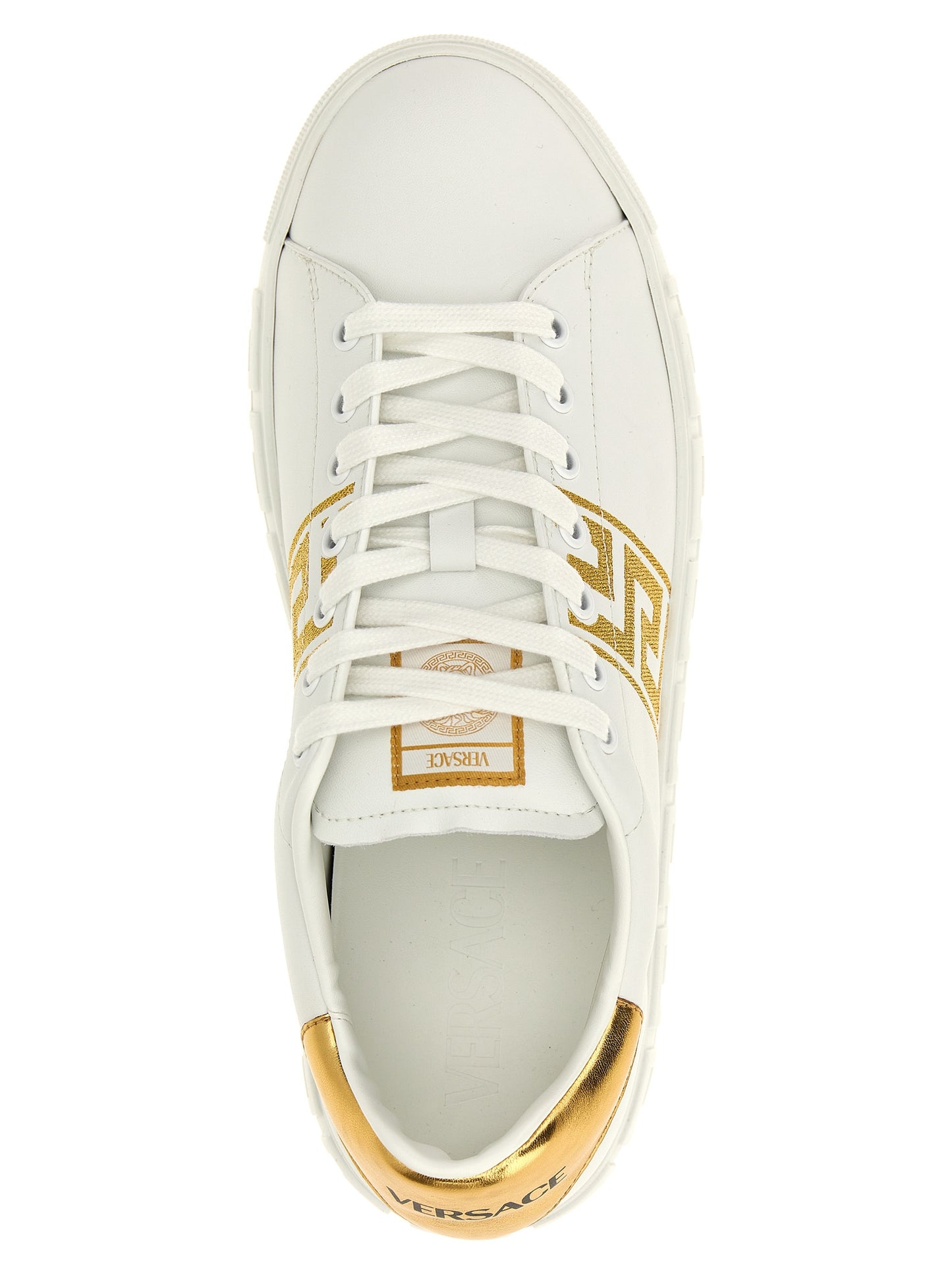 Sneakers by Versace for men in polyamide leather gold presents a impeccable silhouette as Men's Low Top Polyamide Leather Sneakers, expertly defined by a impeccable low-top style for a impeccable, high-fashion look.