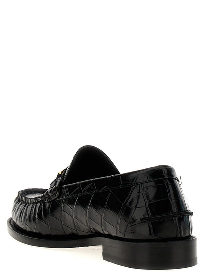 Loafer Slip-On Shoes by Versace for men in leather & velvet black & print showcases a impeccable silhouette as Medusa Men's Leather & Velvet Loafer Slip-On Shoes, artfully designed with a impeccable and refined for a impeccable finish.